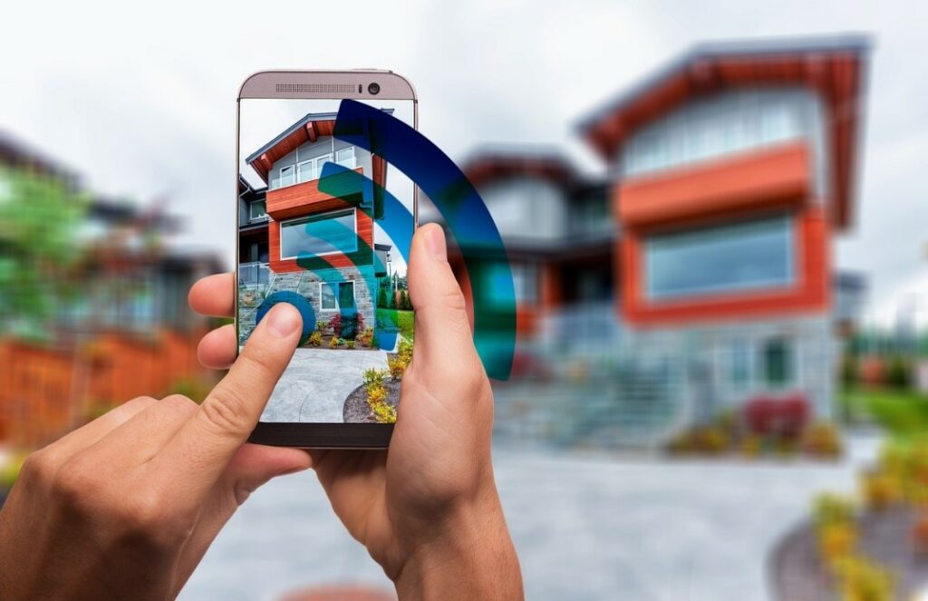 Photo of a home being monitored from a smartphone