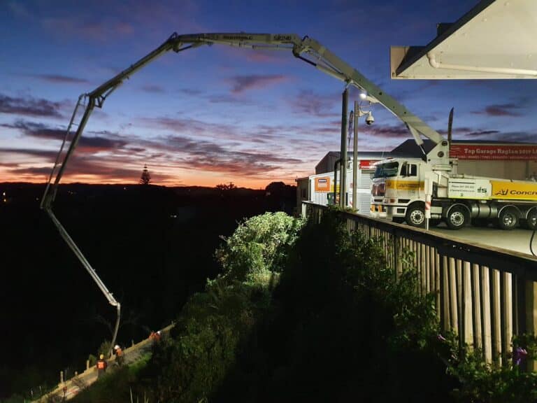 Concrete pumping down steep hill in Raglan, NZ